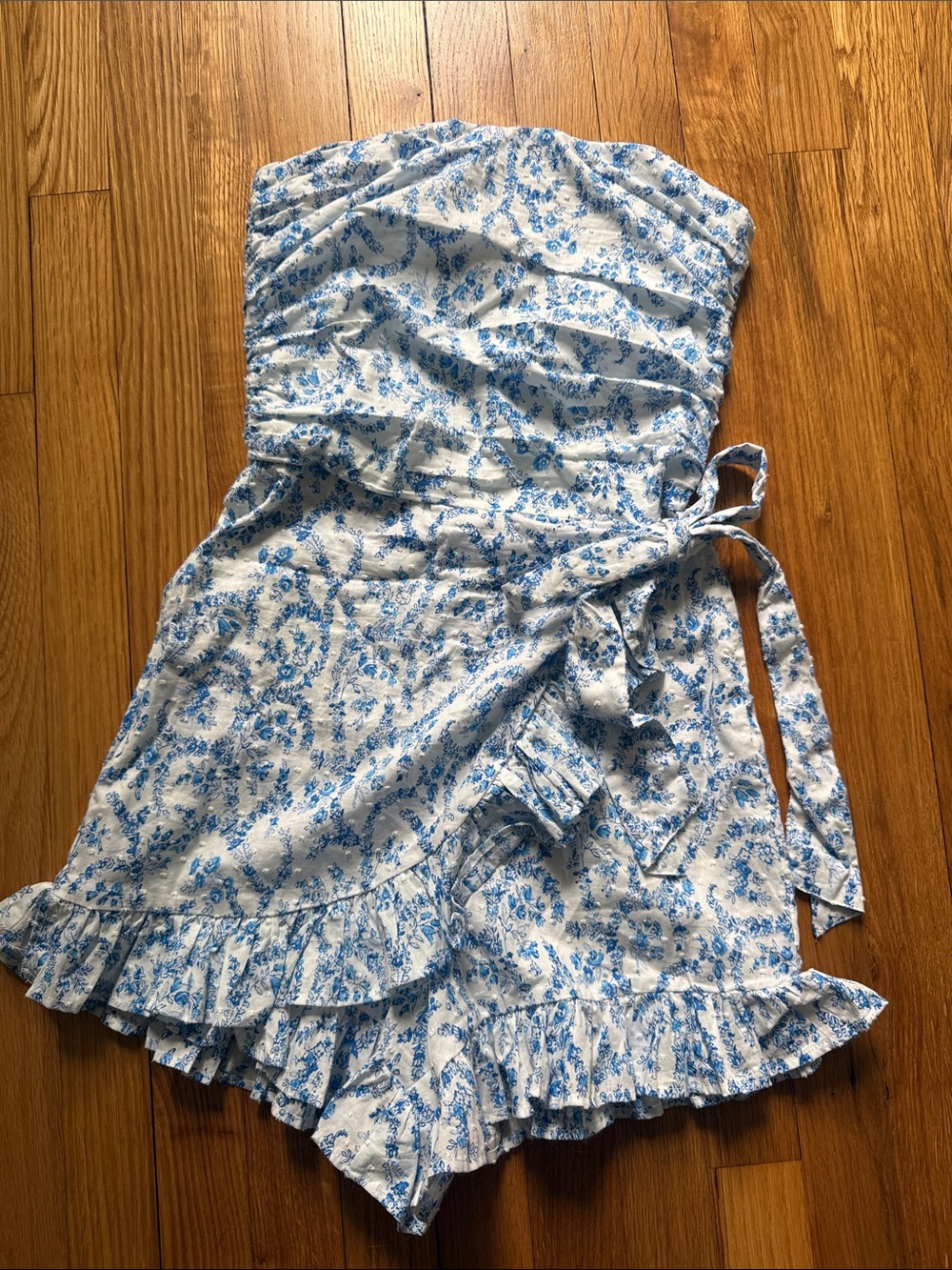 Olivaceous White Strapless Romper with Blue Floral Print